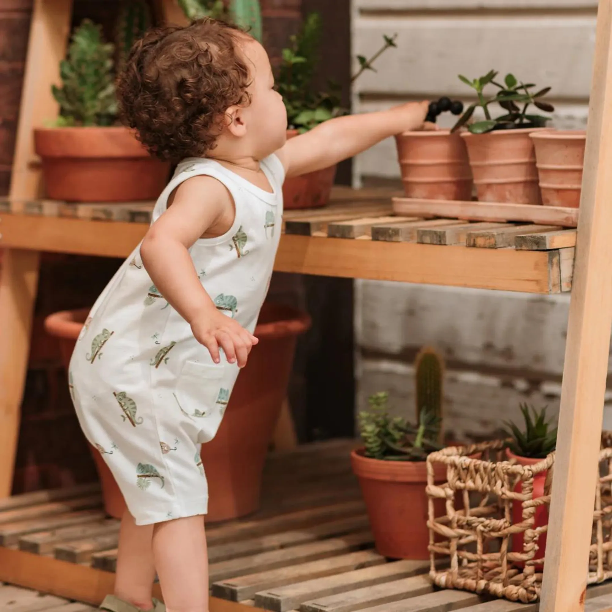 FIRSTS Chameleon Print on Off-White Sleeveless Romper